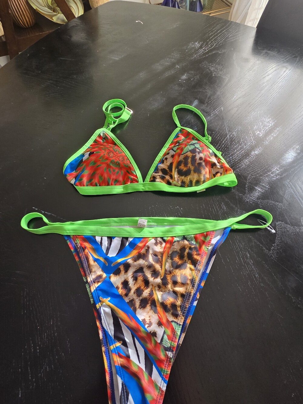 Womans Neon Green Trim Animal & Tropical Print Bikini with a cropped mesh shrug.